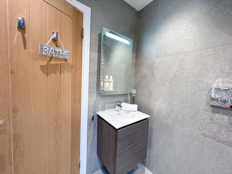 13 Hideaway Suite - Bathroom Sink and Mirror