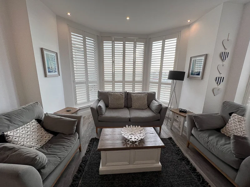 Seating by the bay window in Seagrass Apartment