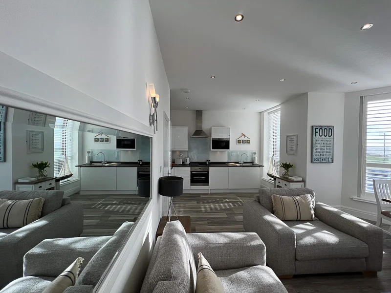 Kitchen and living area in Dunes Apartment
