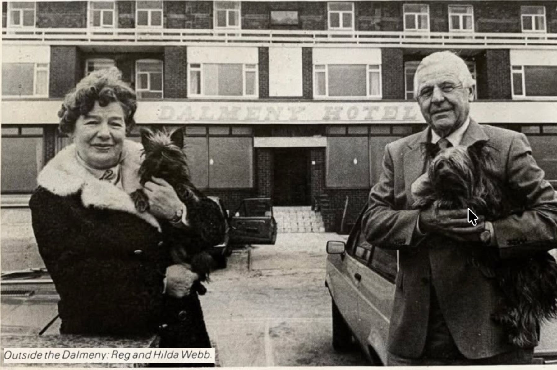 Zoe’s grandparents, Reg and Hilda Webb, holding their dogs outside the Dalmeny Hotel