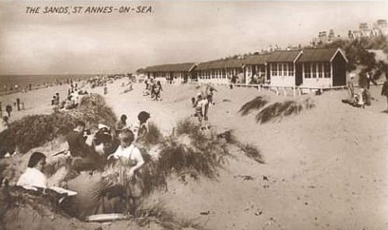 A postcard view of the sands and beach huts at St Annes