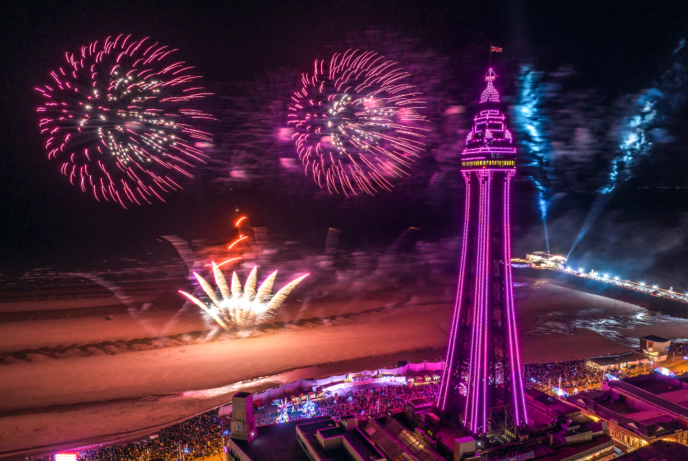 Fireworks lighting the sky beside Blackpool Tower